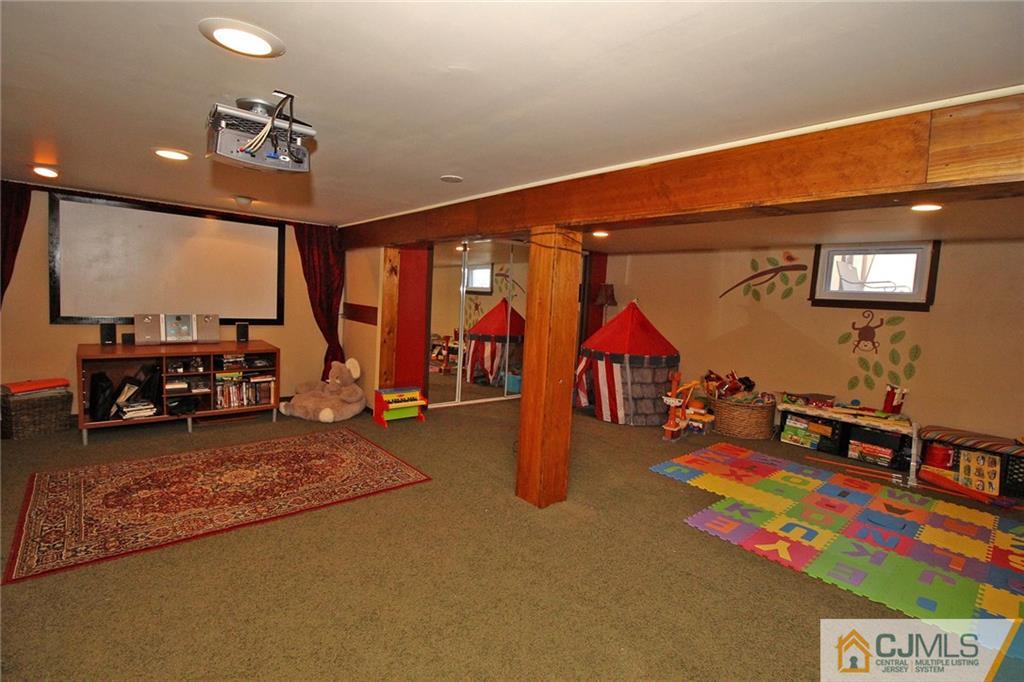 130 Ethel Road Edison, NJ 08817 - Photo 22 of 25 a living room with furniture and pool table