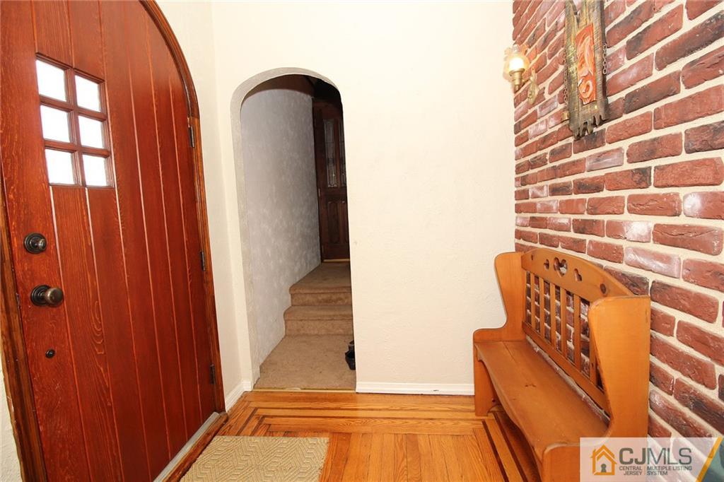 130 Ethel Road Edison, NJ 08817 - Photo 4 of 25 a view of an entryway with wooden floor