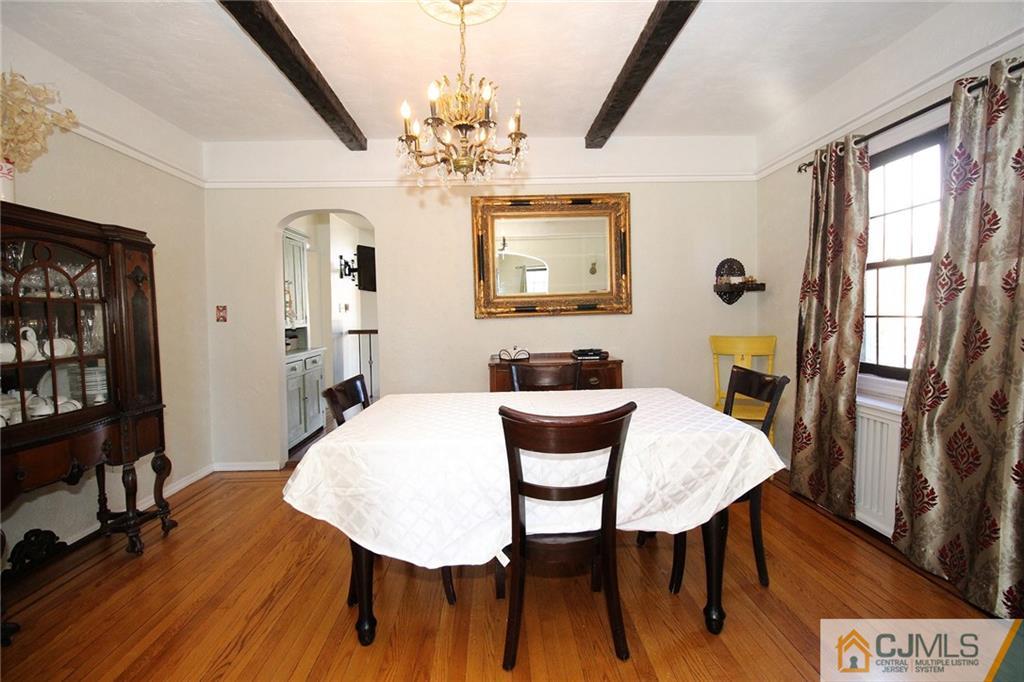 130 Ethel Road Edison, NJ 08817 - Photo 7 of 25 a view of a dining room with furniture window and wooden floor
