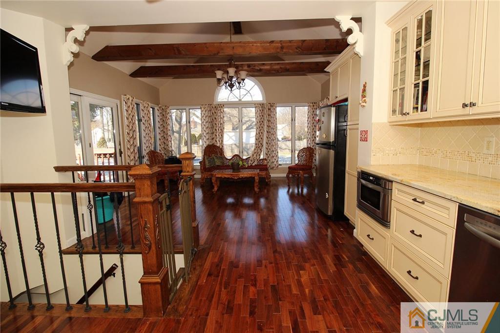 130 Ethel Road Edison, NJ 08817 - Photo 10 of 25 a view of a entryway with wooden floor
