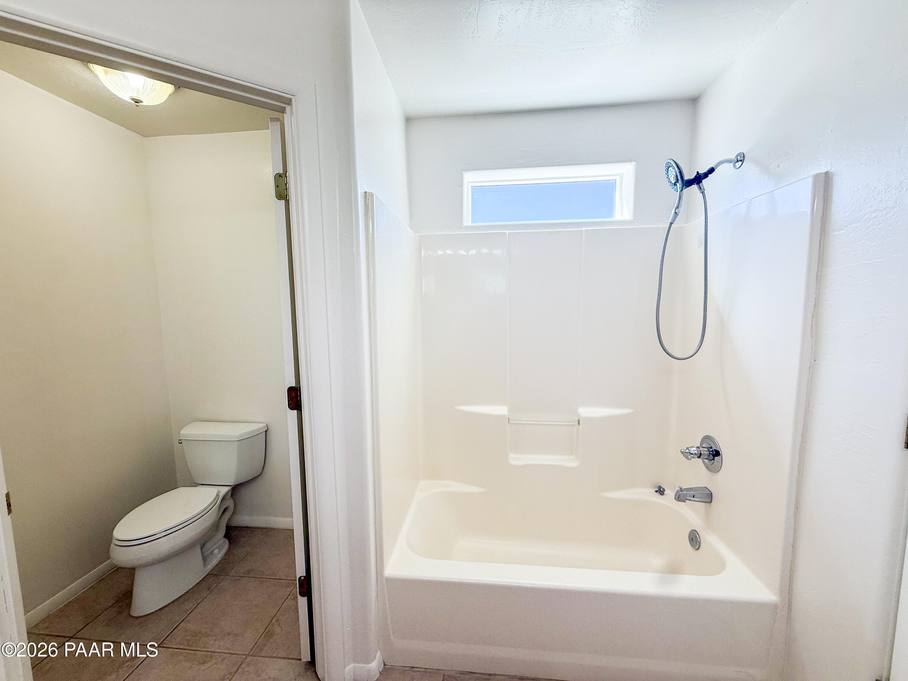 430 West Lake Louise Road Paulden, AZ 86334 - Photo 13 of 19 a bathroom with a granite countertop bathtub shower and toilet