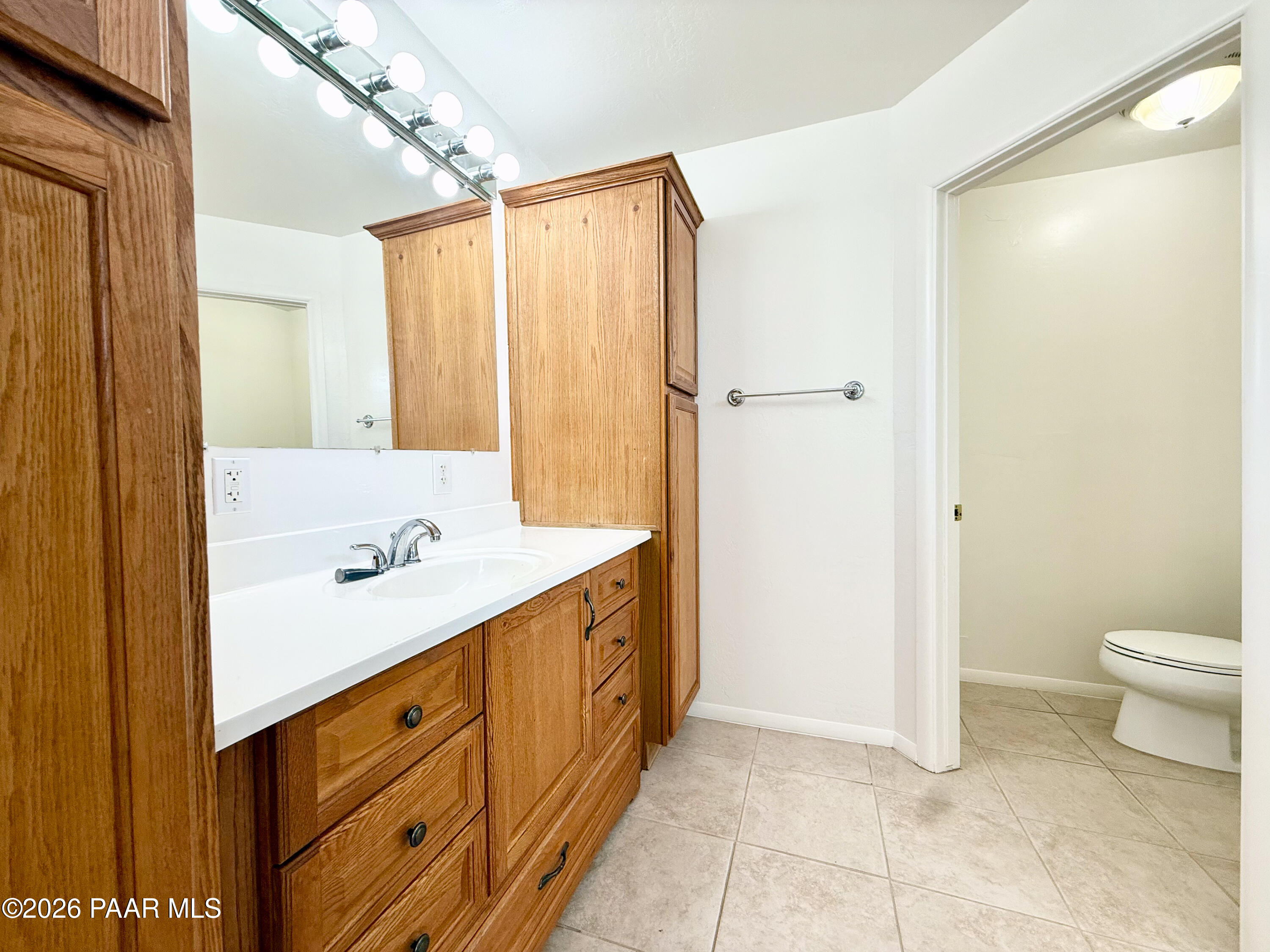 430 West Lake Louise Road Paulden, AZ 86334 - Photo 14 of 19 a bathroom with a granite countertop sink a toilet and shower