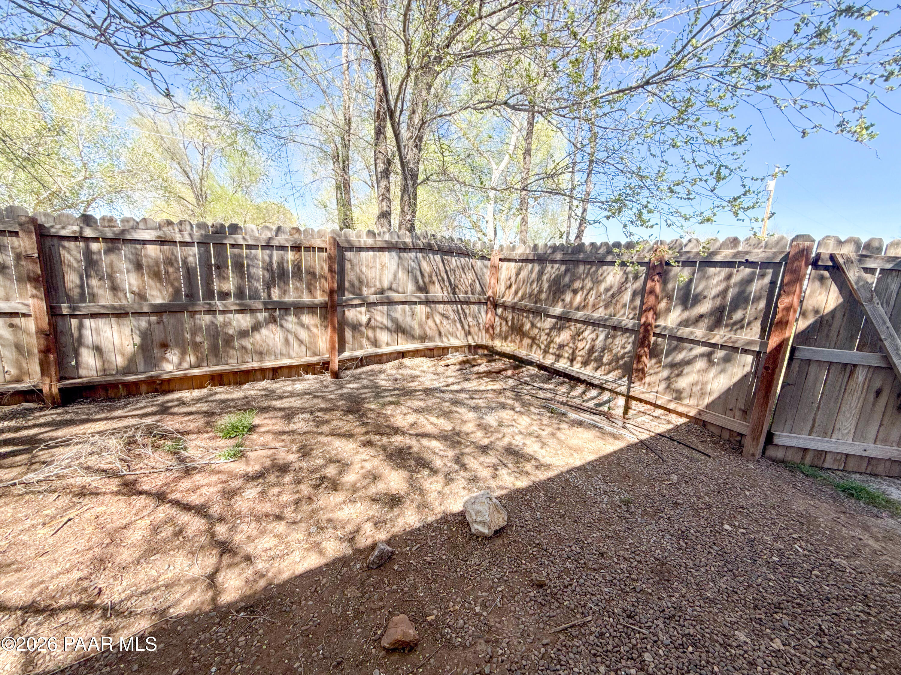 430 West Lake Louise Road Paulden, AZ 86334 - Photo 16 of 19 a view of outdoor space with wooden fence