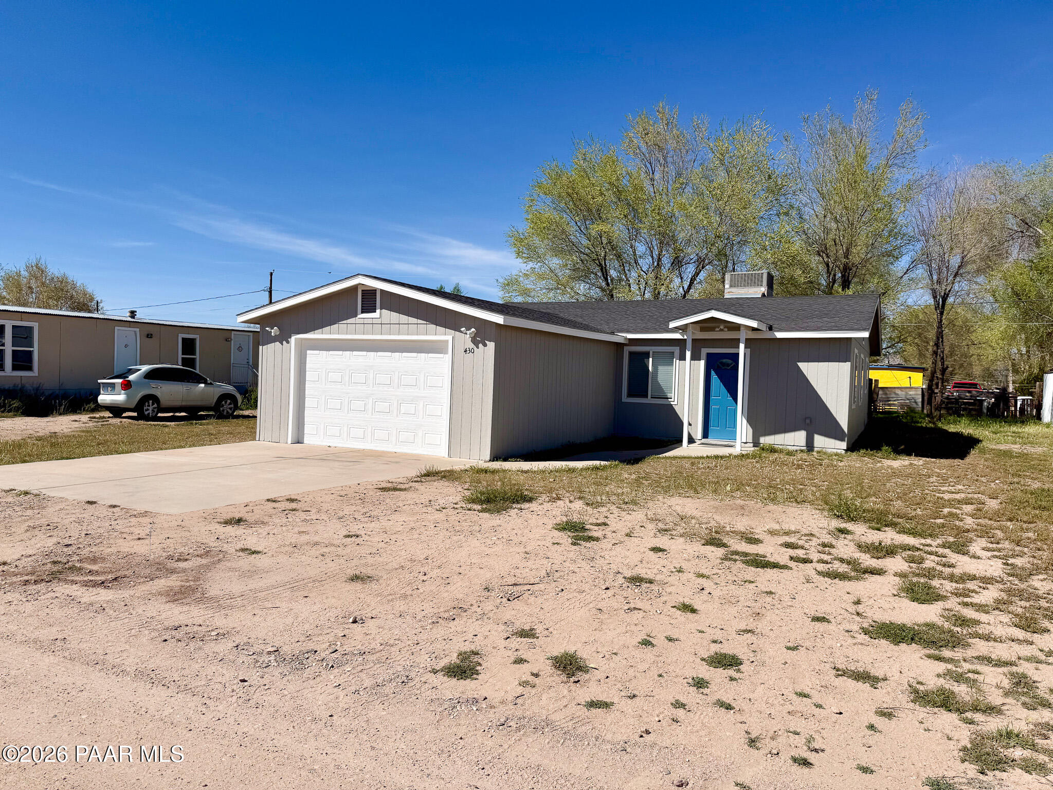 430 West Lake Louise Road Paulden, AZ 86334 - Photo 19 of 19 a front view of a house with a yard