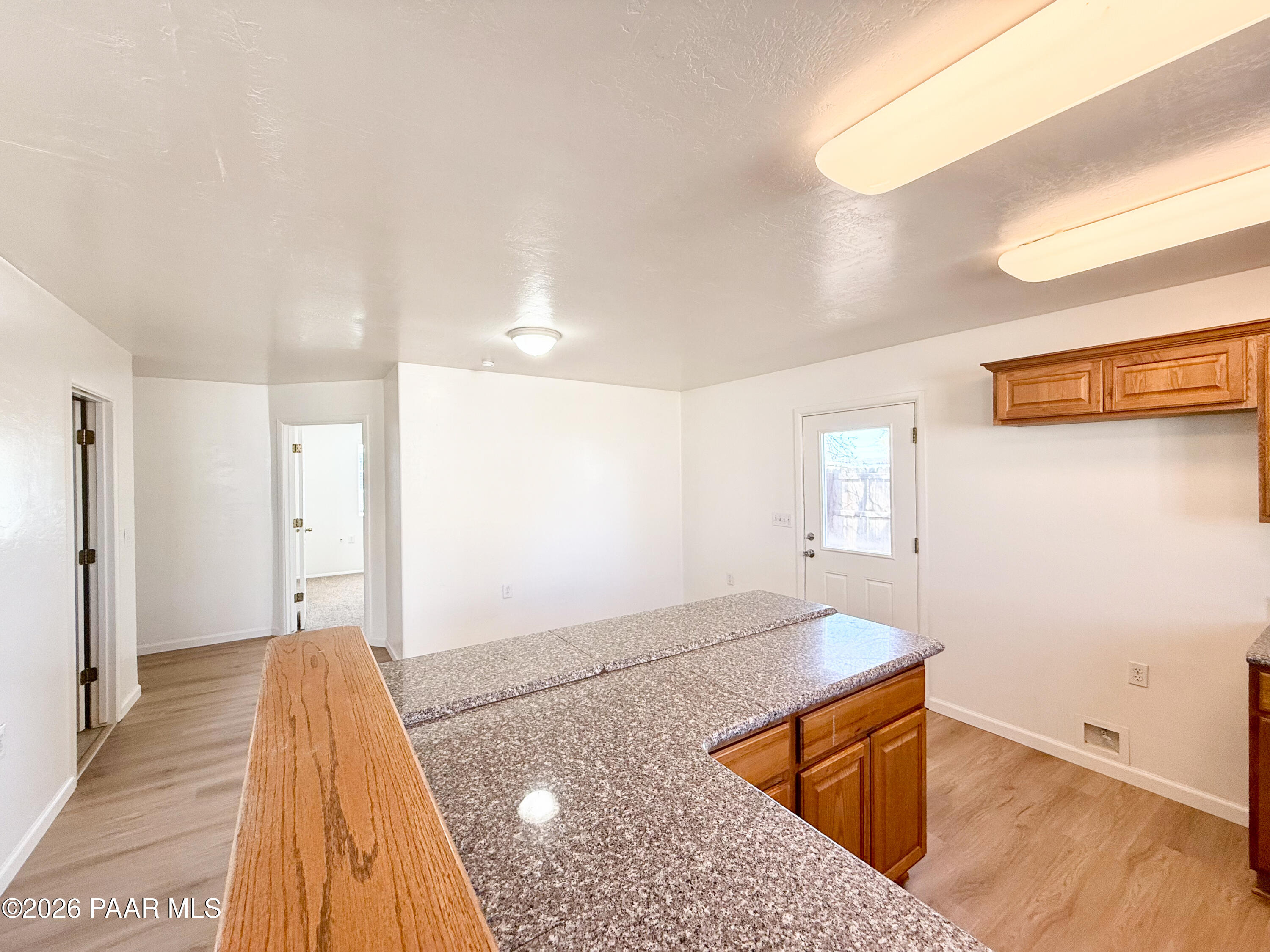 430 West Lake Louise Road Paulden, AZ 86334 - Photo 7 of 19 a view of livingroom with hardwood floor and hallway