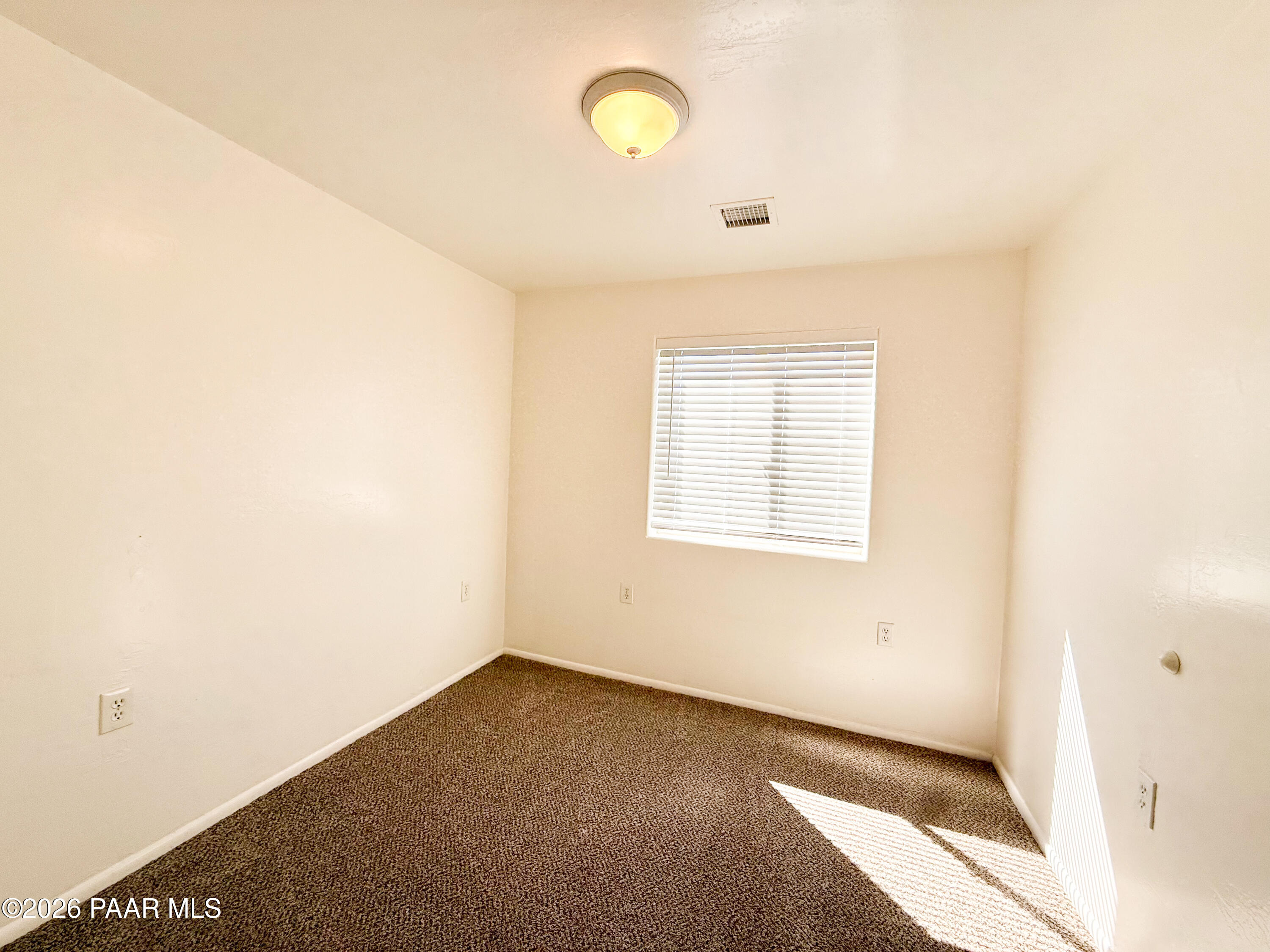 430 West Lake Louise Road Paulden, AZ 86334 - Photo 9 of 19 a view of a room that has a window in it
