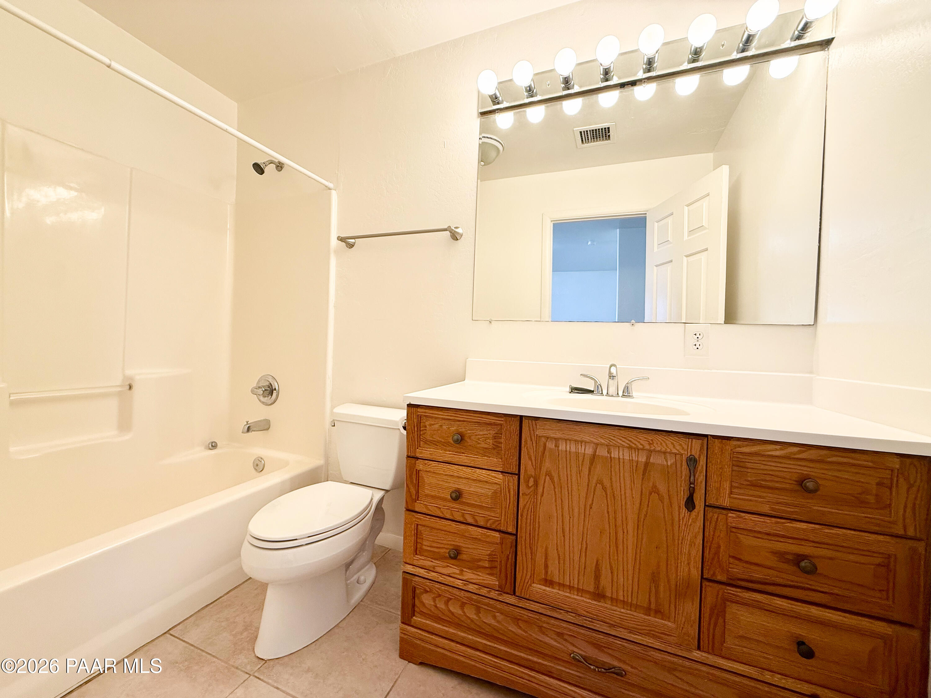 430 West Lake Louise Road Paulden, AZ 86334 - Photo 10 of 19 a bathroom with a sink a toilet and shower