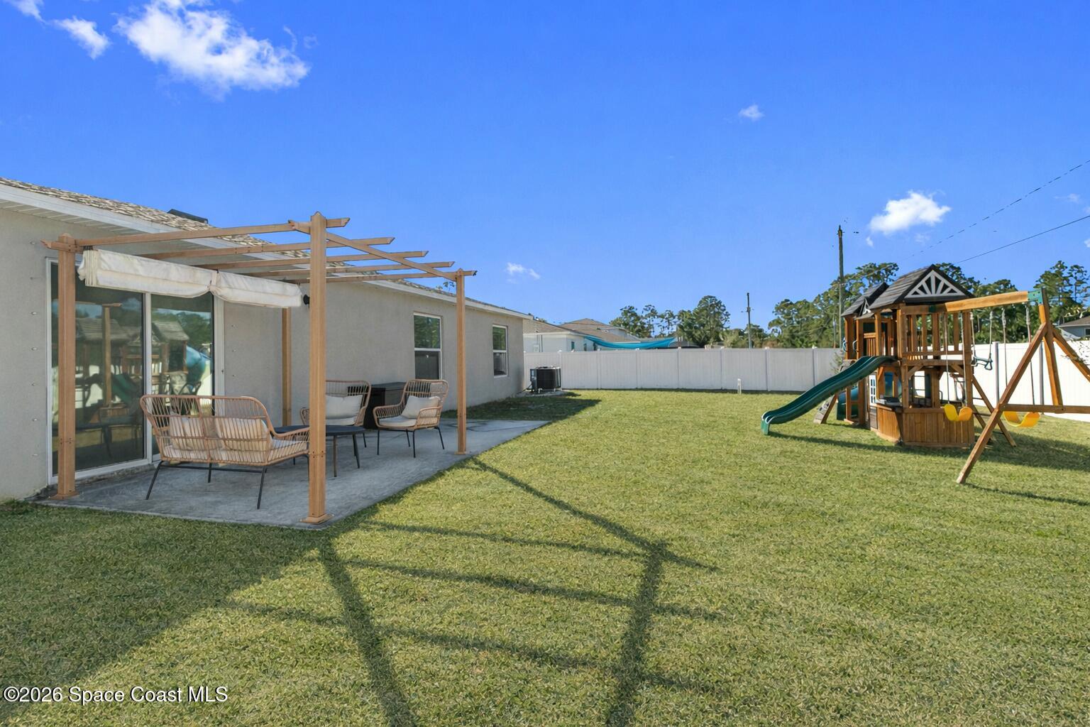 2926 Tishman Road Southeast Palm Bay, FL 32909 - Photo 3 of 29 ChatGPT Image Feb 11, 2026, 09_18_32 PM