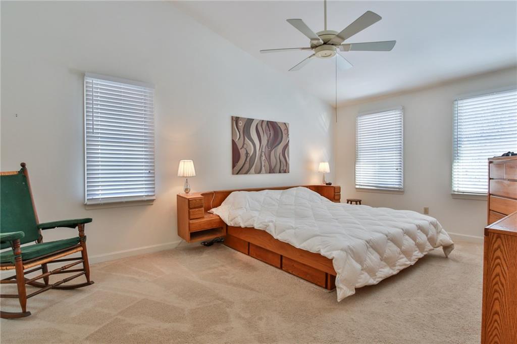 556 Center Church Road Canonsburg, PA 15317 - Photo 12 of 18 The spacious master bedroom offers bright natural light, vaulted ceilings, large walk-in closet, and a private master bathroom.