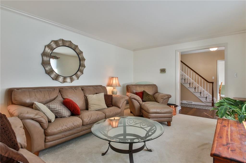 556 Center Church Road Canonsburg, PA 15317 - Photo 3 of 18 Entertain guest in the beautiful living room with abundant natural light!