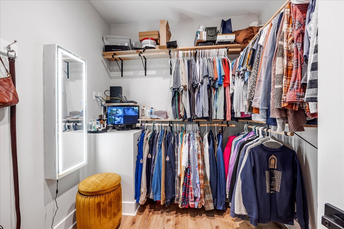 768 Laurel Crown Road Manchester, TN 37355 - Photo 29 of 63 a view of walk in closet with clothes