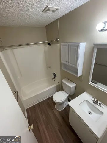 a view of a room with a chandelier