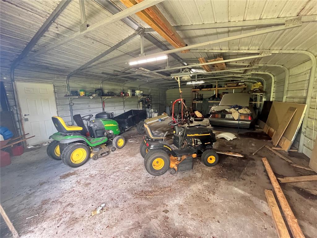 820 Chicken Farm Road Osteen, FL 32764 - Photo 19 of 30 a view of a room with gym equipment