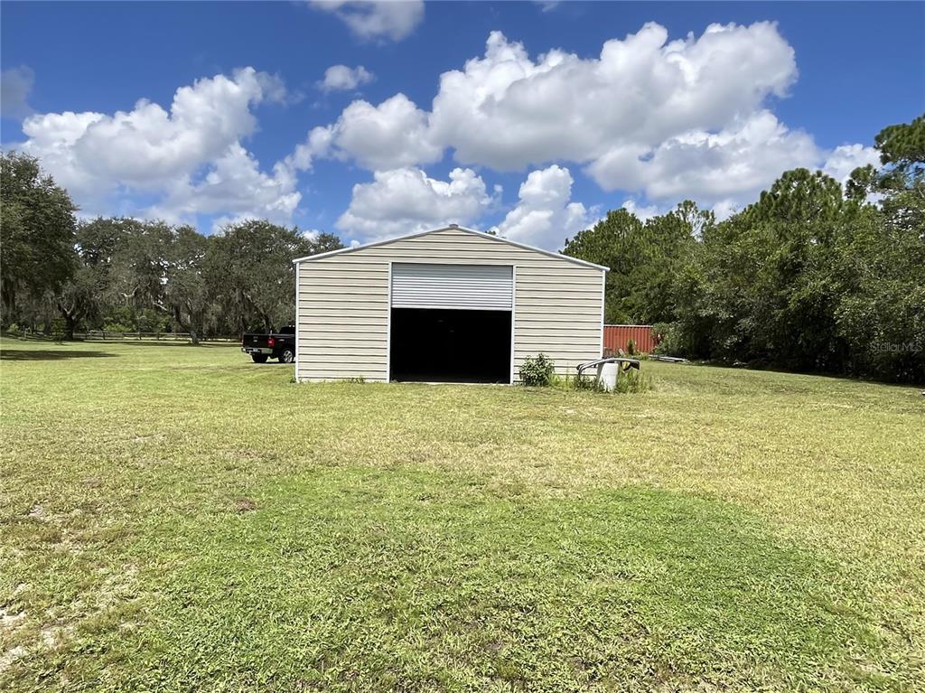 820 Chicken Farm Road Osteen, FL 32764 - Photo 4 of 30 a view of a terrace with yard