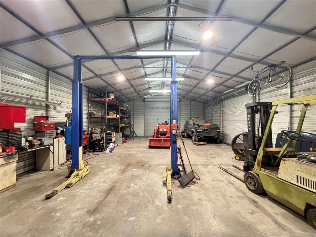 820 Chicken Farm Road Osteen, FL 32764 - Photo 5 of 30 a view of a room with gym equipment