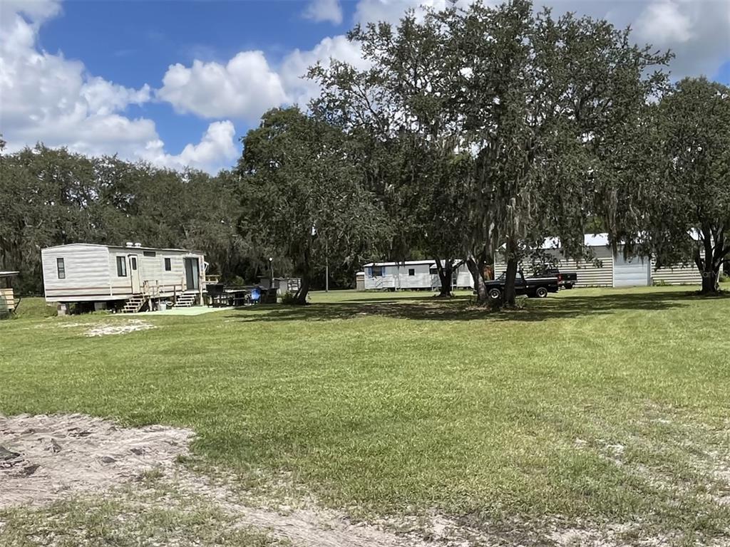 820 Chicken Farm Road Osteen, FL 32764 - Photo 9 of 30 a view of a park with large trees