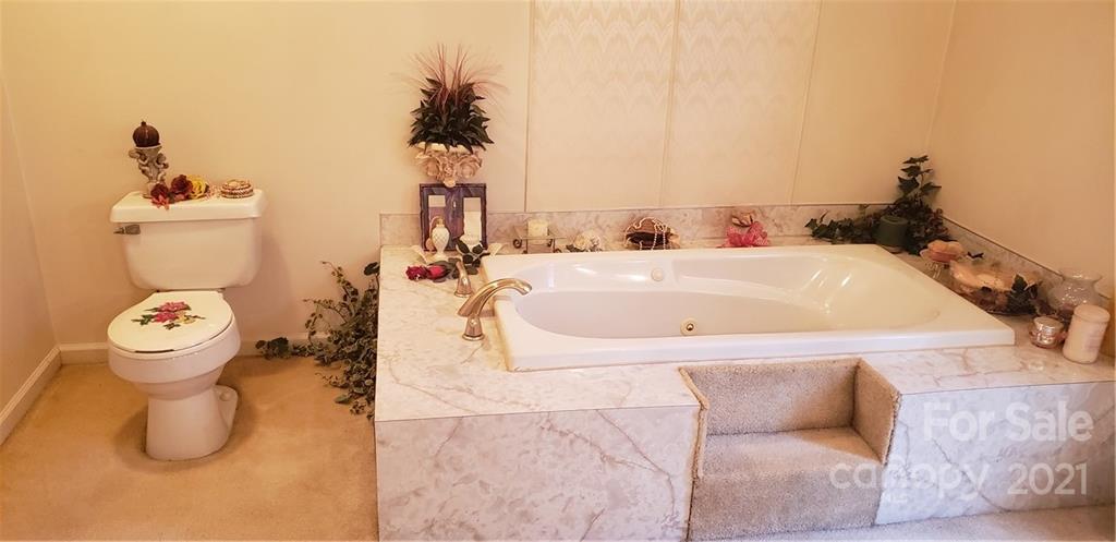 6431 Startown Road Maiden, NC 28650 - Photo 22 of 34 a bathroom with a sink and toilet