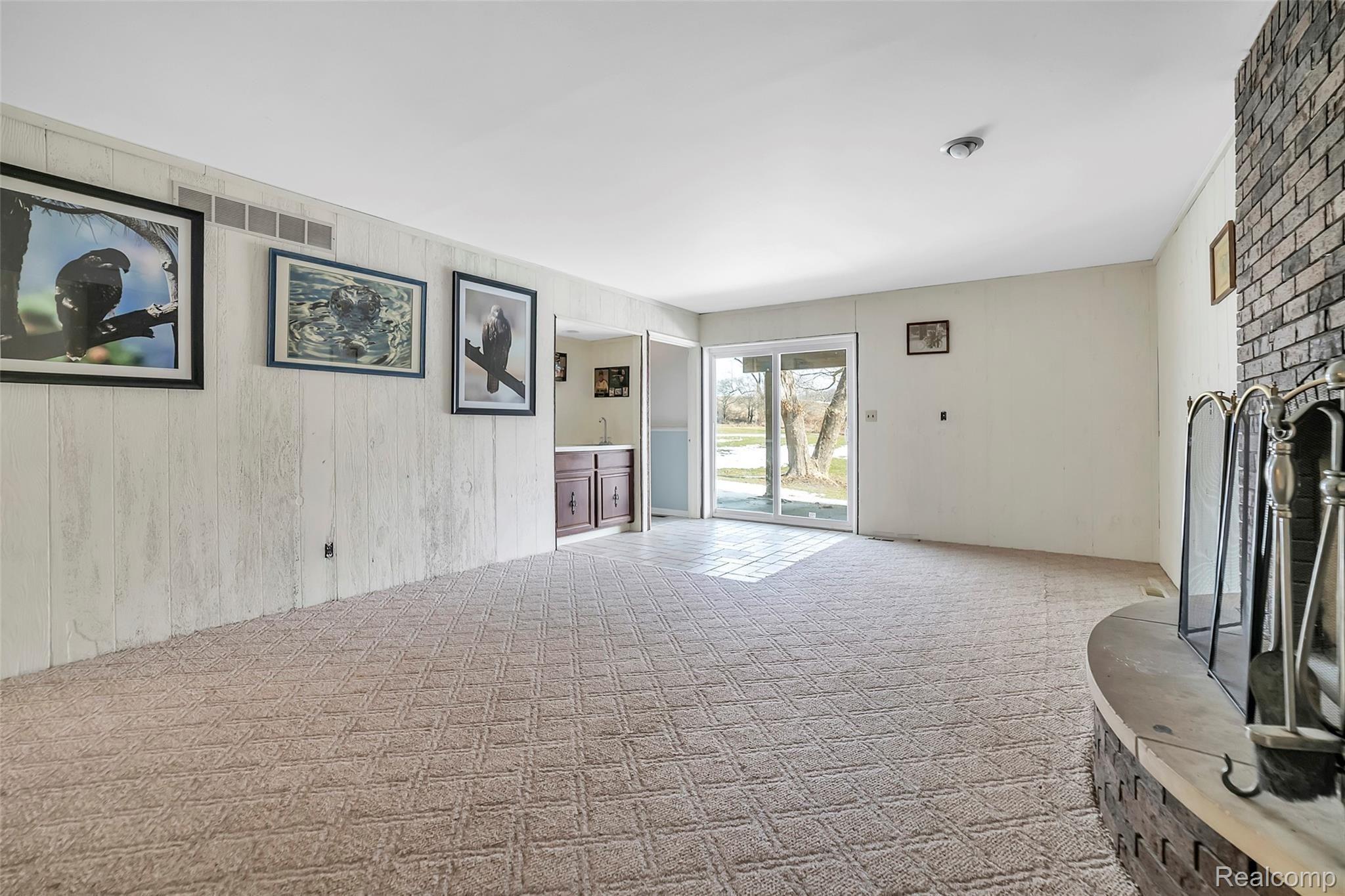 6350 Argentine Road Howell, MI 48855 - Photo 25 of 32 Lower Level Complete with Wet Bar and Fire Place