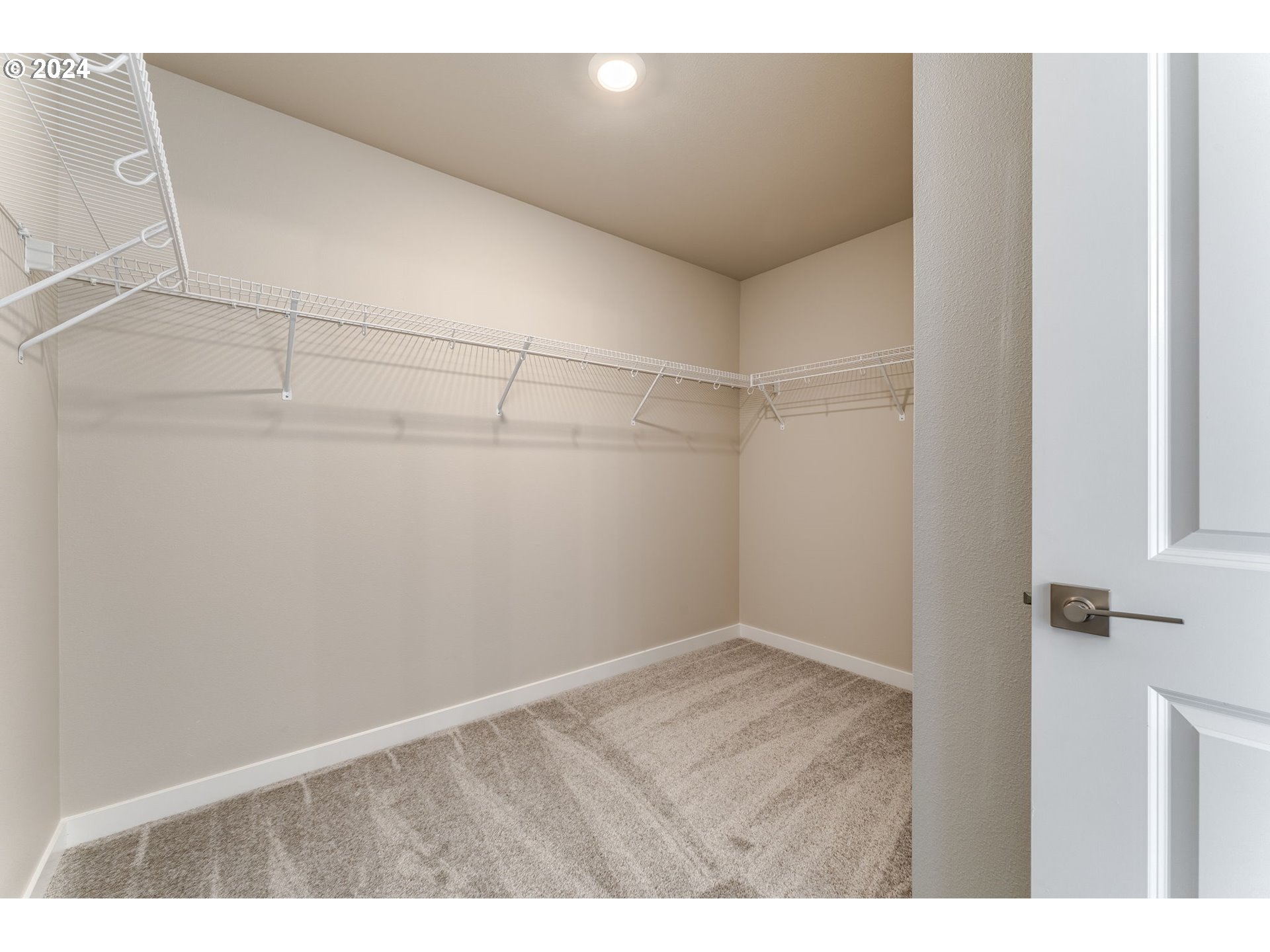 811 Northwest 178th Street Ridgefield, WA 98642 - Photo 23 of 40 a view of a room with racks on the wall