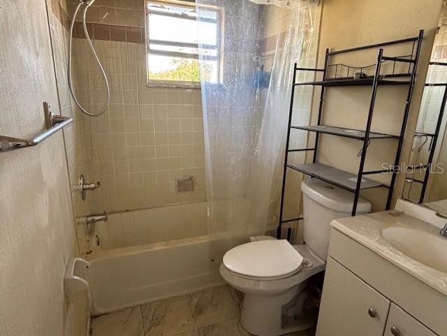 3538 Pinetree Street Port Charlotte, FL 33952 - Photo 12 of 28 a bathroom with a toilet and shower