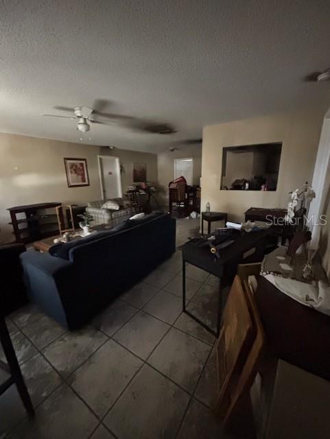 3538 Pinetree Street Port Charlotte, FL 33952 - Photo 13 of 28 a living room with furniture and a flat screen tv
