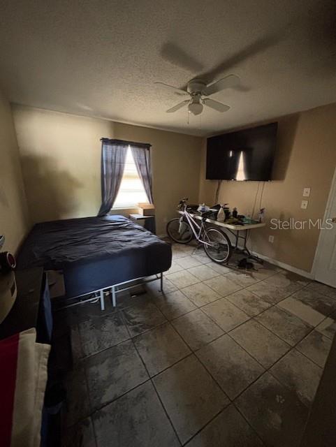 3538 Pinetree Street Port Charlotte, FL 33952 - Photo 15 of 28 a room with gym equipment and a window