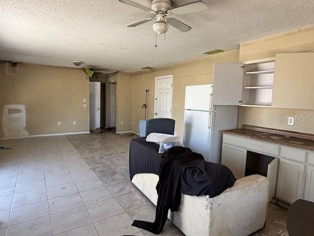 3538 Pinetree Street Port Charlotte, FL 33952 - Photo 10 of 28 a living room with furniture and a fireplace