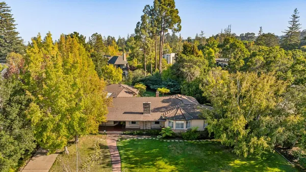 view of a house with a yard