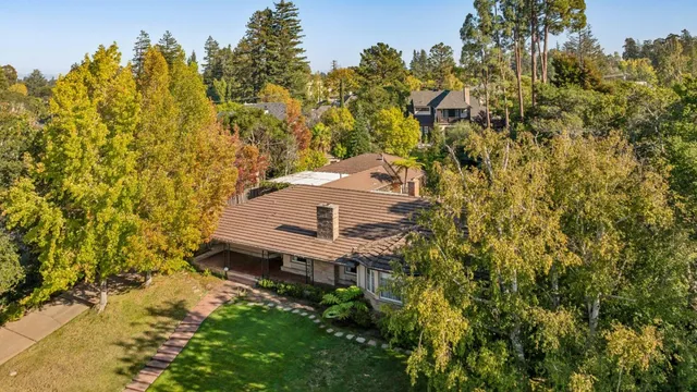 view of a house with a yard
