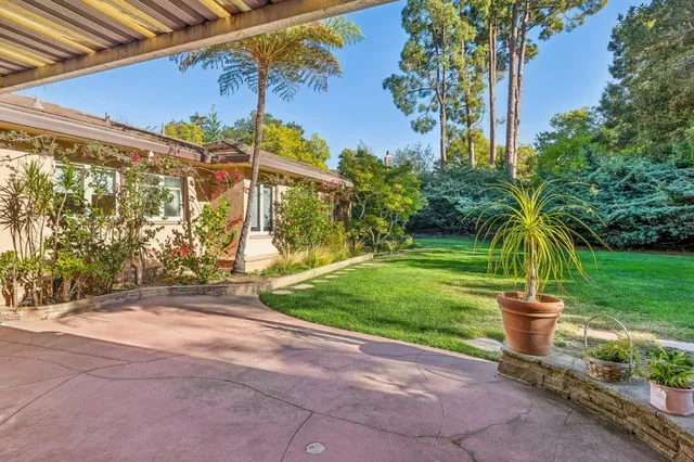 a view of a porch with a yard