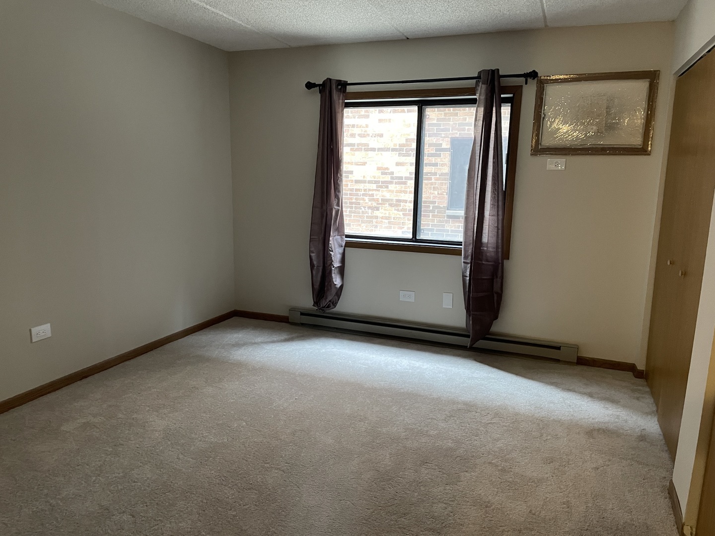 976 North Rohlwing Road, Unit GA Addison, IL 60101 - Photo 13 of 20 an empty room with windows