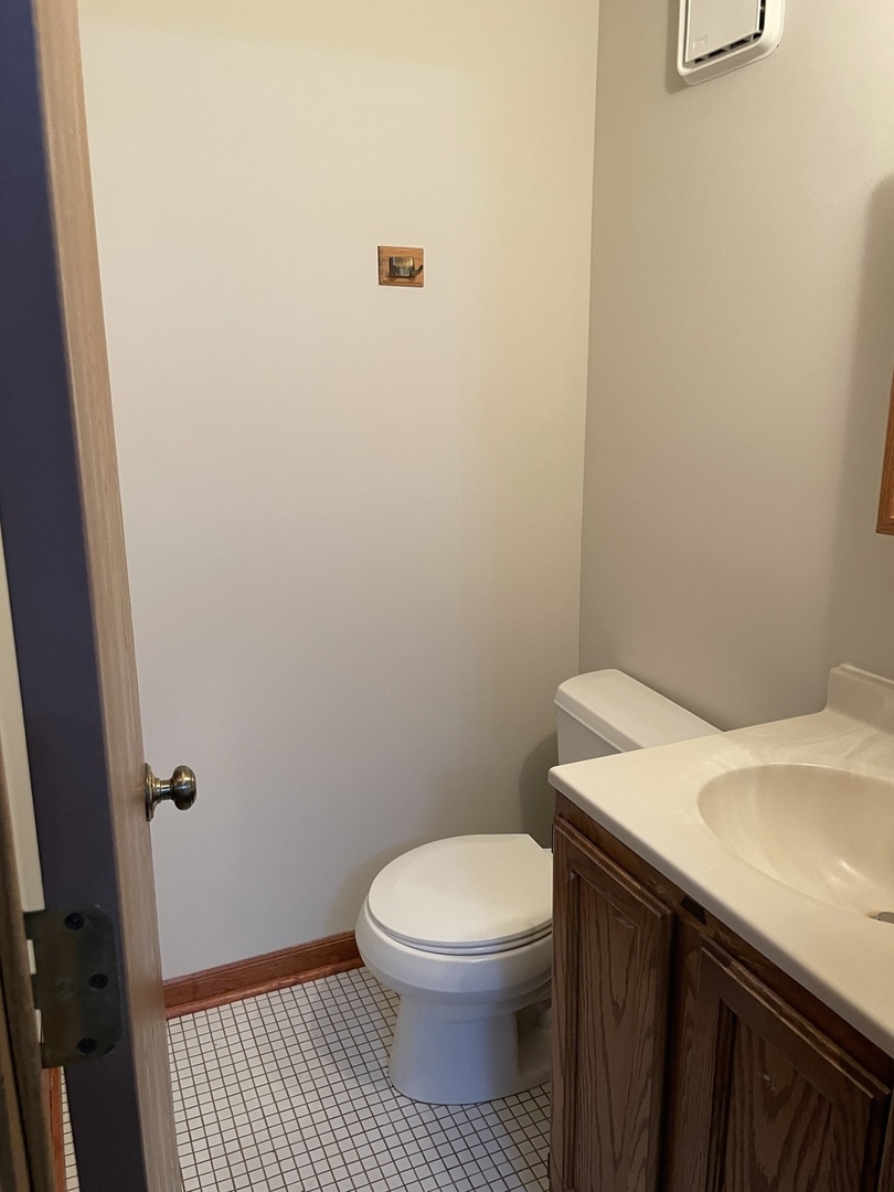 976 North Rohlwing Road, Unit GA Addison, IL 60101 - Photo 14 of 20 a bathroom with a sink and a toilet