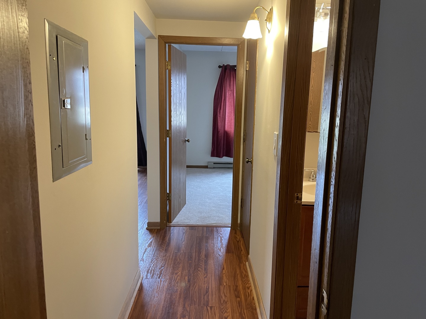 976 North Rohlwing Road, Unit GA Addison, IL 60101 - Photo 10 of 20 a view of a hallway with wooden floor