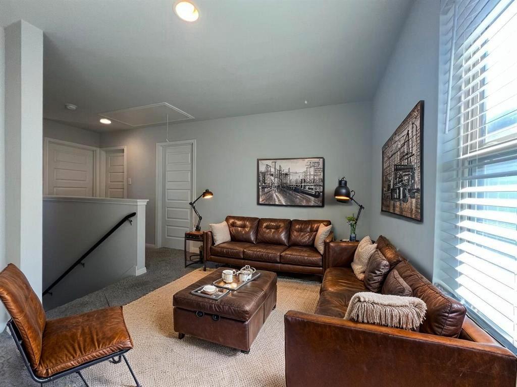 124 Old Stagecoach Road Jarrell, TX 76537 - Photo 14 of 40 a living room with furniture rug and window