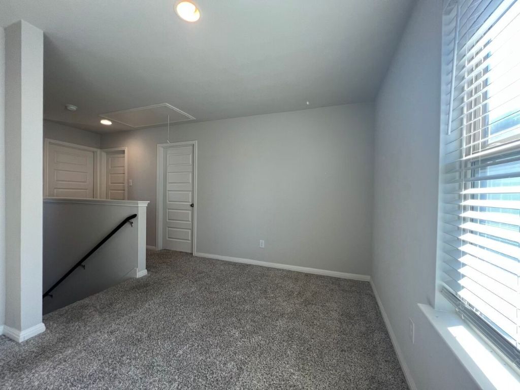 124 Old Stagecoach Road Jarrell, TX 76537 - Photo 15 of 40 an empty room with windows