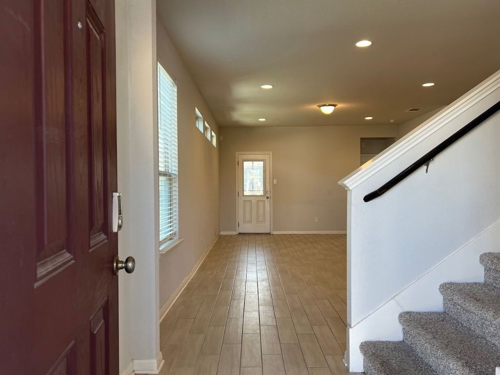 124 Old Stagecoach Road Jarrell, TX 76537 - Photo 3 of 40 a view of entryway with wooden floor