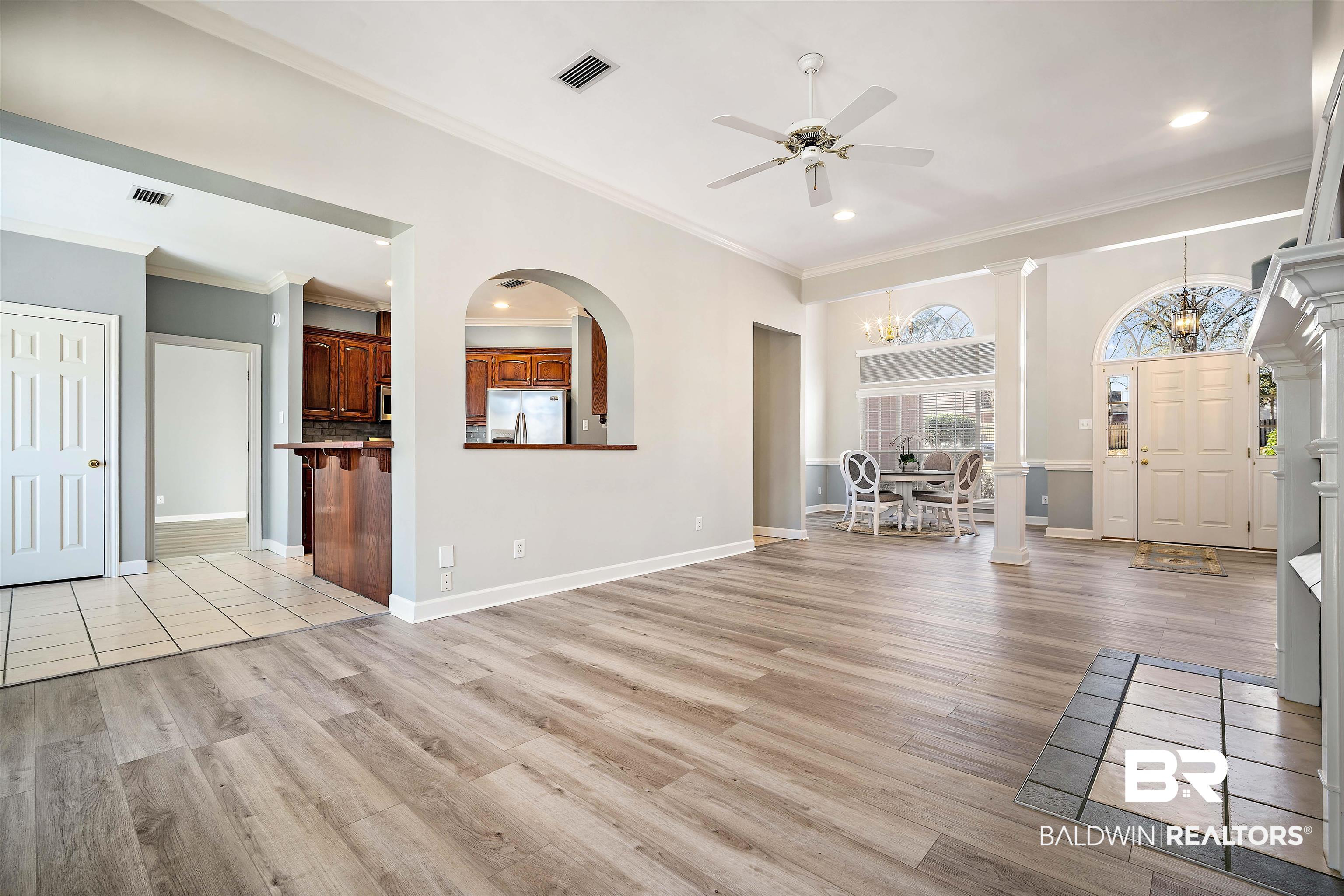 615 Summerlake Place Mobile, AL 36608 - Photo 6 of 35 Foyer featuring light wood-type flooring, ornamental molding, healthy amount of natural light, ceiling fan, and recessed lighting