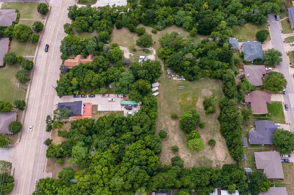 1007 West Belt Line Road Cedar Hill, TX 75104 - Photo 4 of 30 Aerial perspective showcasing a substantial land parcel with mature tree coverage