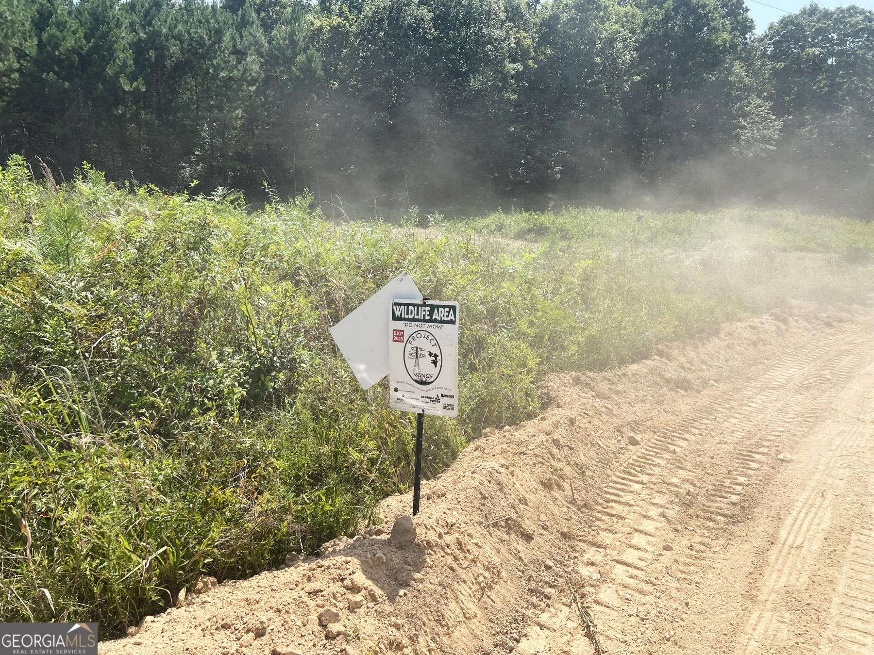 0 Booger Hollow Road Rome, GA 30161 - Photo 12 of 34 a view of a wooden wall with trees in the background