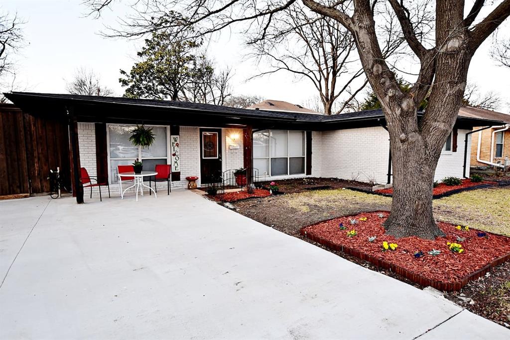 a view of swimming pool with a patio