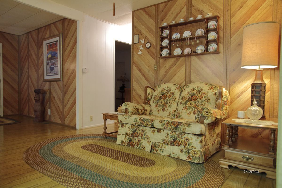 46 Pine Cove Road Idyllwild, CA 92549 - Photo 15 of 24 a living room with a couch and a table