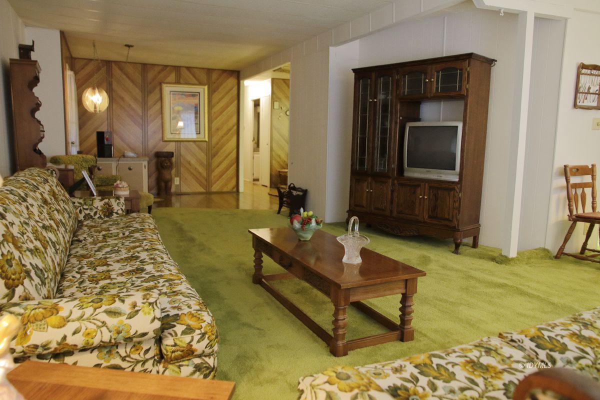 46 Pine Cove Road Idyllwild, CA 92549 - Photo 2 of 24 a living room with furniture and a flat screen tv