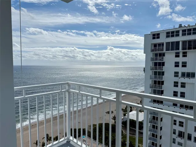 a view of a balcony with an outdoor space