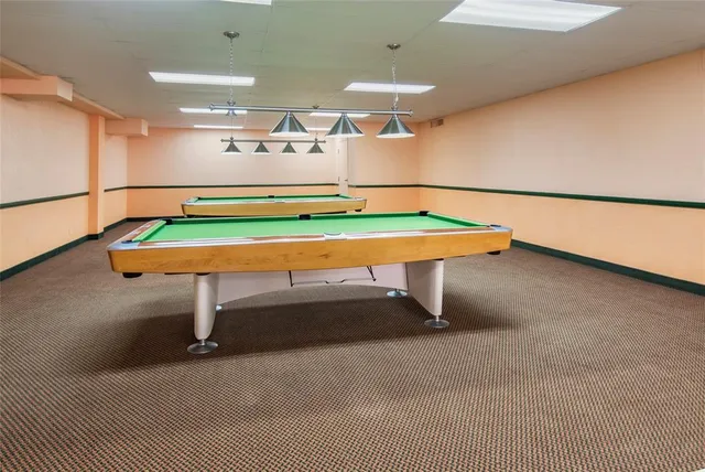 a room with pool table