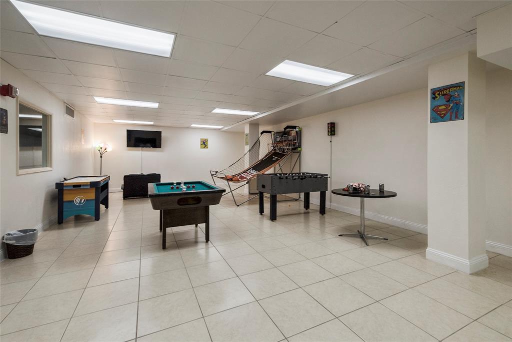 101 Briny Avenue, Unit 2604 Pompano Beach, FL 33062 - Photo 27 of 31 a outdoor space with lots of tables and chairs