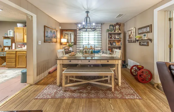 a living room with a couch and a table