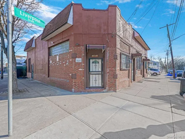 a view of a building along the street