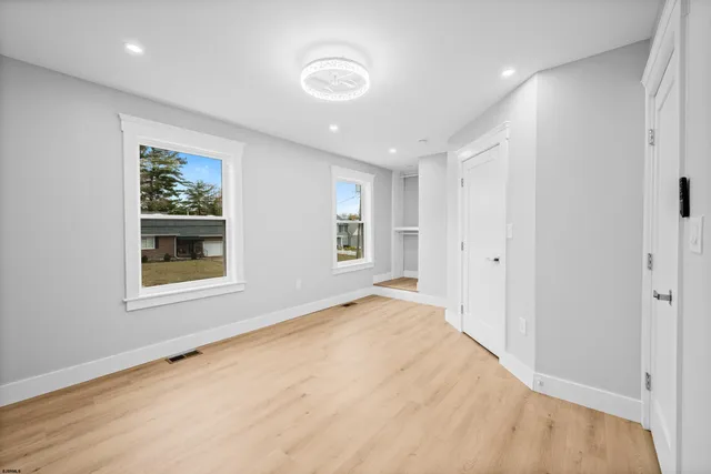 a bathroom with a bath tub and a shower