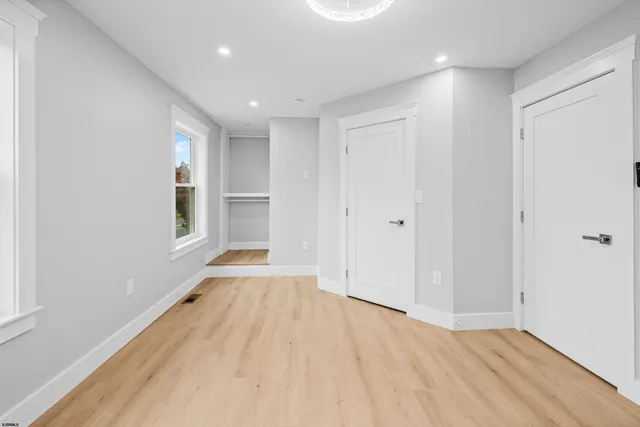 a view of hallway with shower