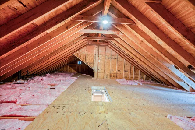 a view of a porch with wooden floor and outdoor space